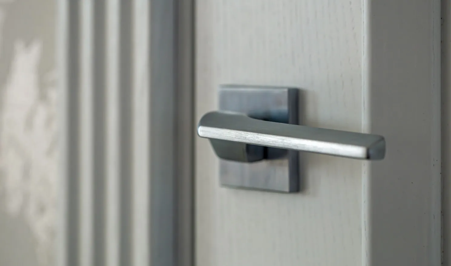 Brushed steel lever door handle